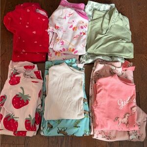 Six pairs of 5T pajamas